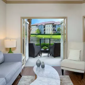 Living room patio view of lake with water feature