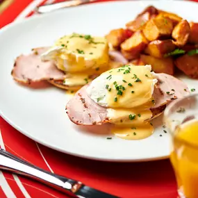 Classic Eggs Benedict - canadian bacon or smoked salmon, potatoes, salad