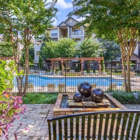 Outdoor relaxation lounge area adjacent to our beautiful pool at Camden Asbury Village in Raleigh, NC
