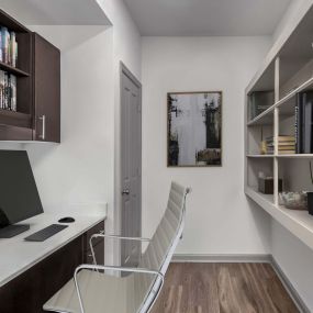Office space with built-in desk, shelving, and closet at Camden Asbury Village in Raleigh, NC.