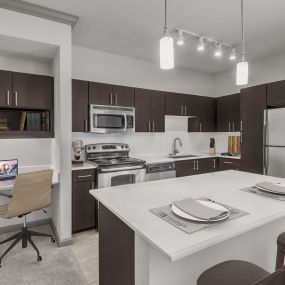 Large kitchen with built-in desk for work or study at Camden Asbury Village in Raleigh, NC