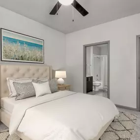 Spacious bedroom with ceiling fan and en-suite bathroom at Camden Asbury Village in Raleigh, NC.