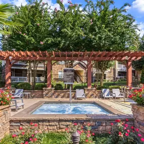 Hot tub surrounded by flowers at Camden Asbury Village in Raleigh, NC