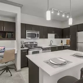 Large kitchen with built-in desk for work or study at Camden Asbury Village in Raleigh, NC