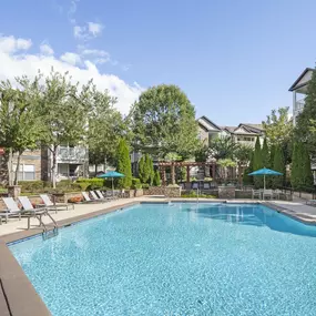 Camden Asbury Village Apartments Raleigh NC Pool with Fireplace and Lounge Seating