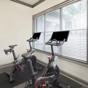 Camden Asbury Village apartments fitness center with Peloton bikes located in Raleigh, NC