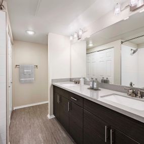 Modern bathroom with dual vanity sinks