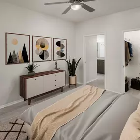 Ensuite Bedroom with walk-in closet and ceiling fan at Camden Caley in Englewood, CO