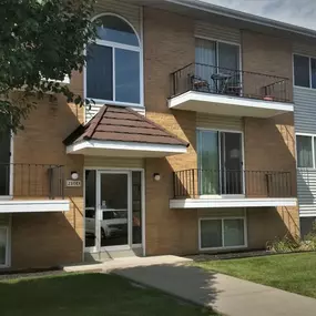 Apartment Building Exterior View by the Entrance