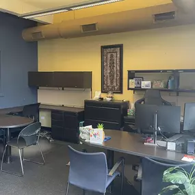 Debbie's desk and an open table inside the agency