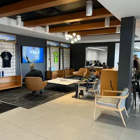 Jeff Wyler Chrysler Dodge Jeep Ram of Fort Thomas customer waiting area showcased in this photo, featuring comfortable seating, Jeep brand displays, and a welcoming atmosphere where guests can relax while their vehicles are serviced or during sales consultations.