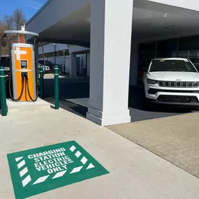 Jeff Wyler Chrysler Dodge Jeep Ram of Fort Thomas electric vehicle charging stations showcased in this photo, providing convenient on-site charging options for hybrid and electric vehicle owners near Northern Kentucky.