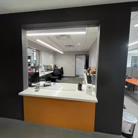 Jeff Wyler Chrysler Dodge Jeep Ram of Fort Thomas check-in desk showcased in this photo, where customers are greeted and assisted by dealership staff for service appointments, vehicle inquiries, and sales consultations in a professional and welcoming environment.