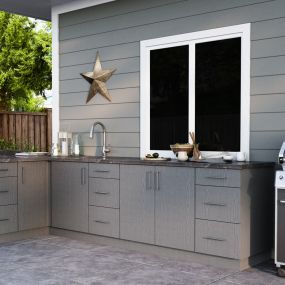 Need to create a beautiful new outdoor space for this summer? Check out this Outdoor Kitchen we created! We can help you come up with the right design for your backyard!