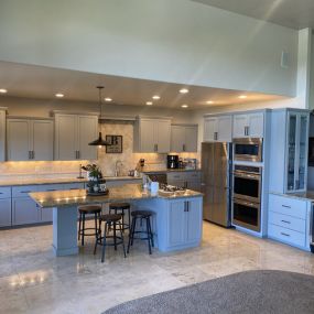 Rather than replacing your existing cabinets, reface them! Cabinet refacing can bring new life to your kitchen and this before & after is the perfect example.