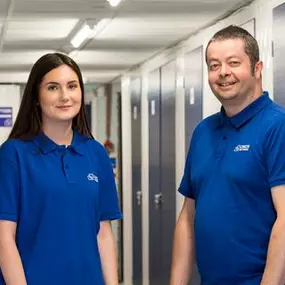 Team members of Cinch Self Storage in corridor - Cinch Self Storage