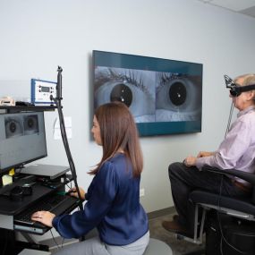 Meredith Wilken (Founder & Audiologist) conducts vestibular testing in the rotary chair