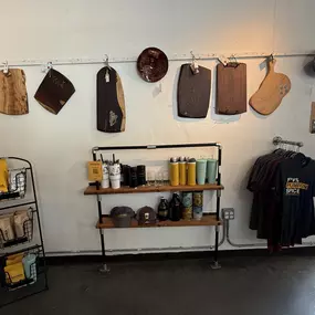 Kahwa merchandise & local artwork wall