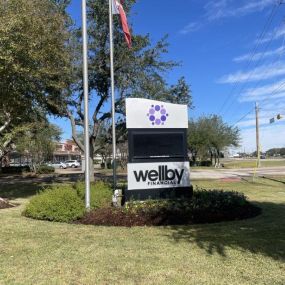 Exterior signage of Wellby Financial in Clear Lake Ellington