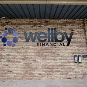Exterior signage of Wellby Financial in Houston Park Place