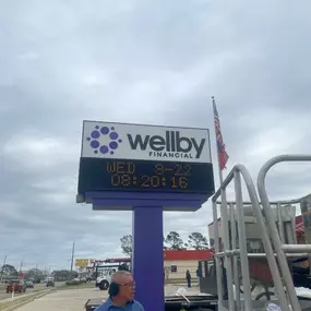 Exterior signage of Wellby Financial in La Porte