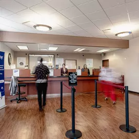 Interior lobby of federal credit union with finance professionals