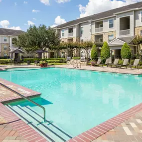 Resort-style pool with WiFi and Lounge Seating at Camden Downs at Cinco Ranch in Katy, TX.