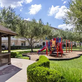 Private playground and seating area at Camden Downs at Cinco Ranch in Katy, TX.