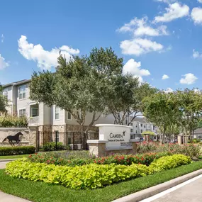 The front entrance of Camden Downs at Cinco Ranch Apartments in Katy, TX.