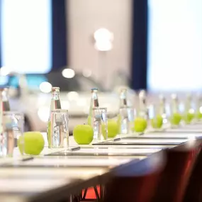 Conference Centre Apples and Water On Tables