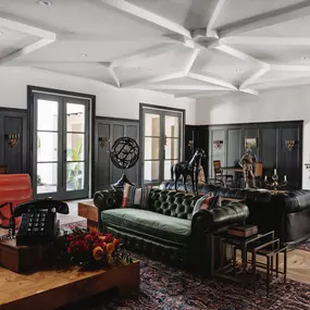 Sitting room with sofas and framed art.
