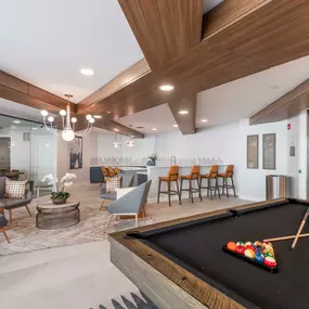 Resident lounge pool table cold brew entertaining area