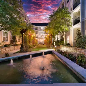 Nighttime photo of outdoor courtyard at Camden Dulles Station