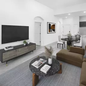 Open-concept living area with high ceilings at Camden Dulles Station apartments in Herndon, VA