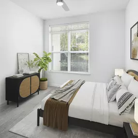 Spacious bedroom with wood-style flooring at Camden Dulles Station apartments in Herndon, VA