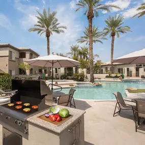 Poolside barbecue grill with dining areas