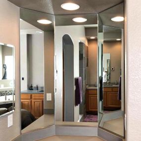 Vanity Bathroom Mirror Installed to make the room look more open and appealing! Measured and installed by Cut Rate Glass.