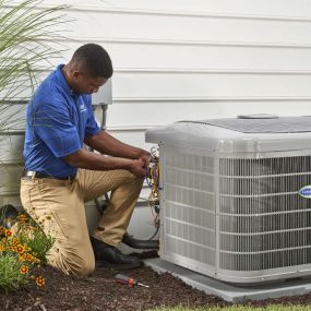 Carrier tech working on HVAC unit Jasper, TX