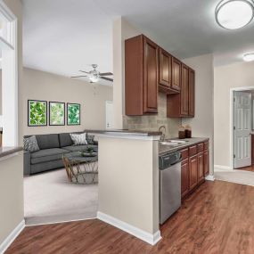 Kitchen with adjacent sunroom and living room