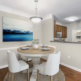 Dining area with hardwood-style flooring