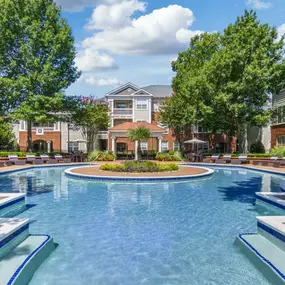 Resort style pool with lounge chairs