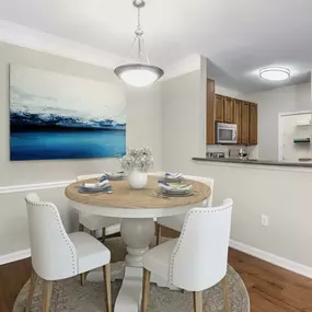 Dining area with hardwood-style flooring