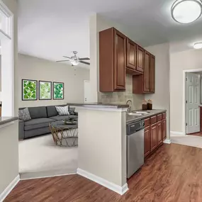 Kitchen with adjacent sunroom and living room