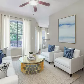 Living room with wood look flooring and ceiling fan overlooking private balcony