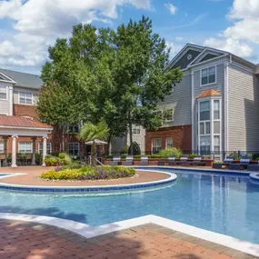 Resort style pool with landscaping