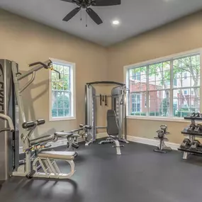 Fitness Center with strength training equipment and free weights