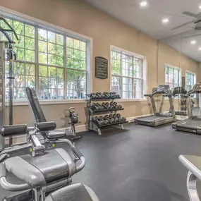 24-hour fitness center with strength and cardio equipment