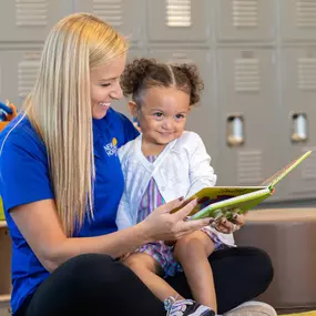 Teacher and Child at New Horizon Academy Burnsville.