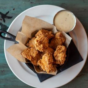 Our Popcorn Chicken is not like the others!  Come try our bite sized pieces of organic chicken breast served up fresh and crunchy with your choice of dipping sauce.