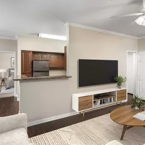 Living room, kitchen, and dining area with access to bedroom and bathroom at Camden Centreport apartments in Fort Worth, Texas